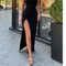 Black maxi dress with high slit, side view