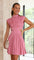 Pink dress with cut-out details and pleated skirt front view