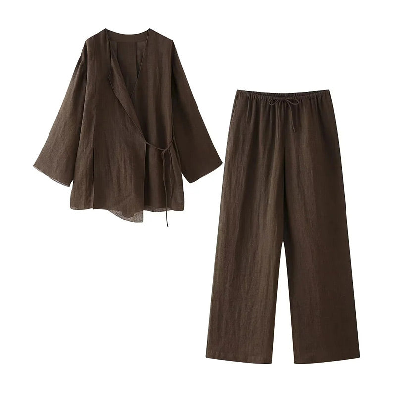Brown loungewear set with wrap top and wide-leg pants flat lay