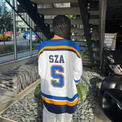 Sweatshirt with large 'SZA' and '5' on chest, blue and white, back view