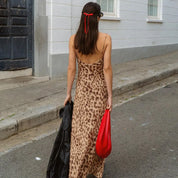 Leopard print dress back view walking on street