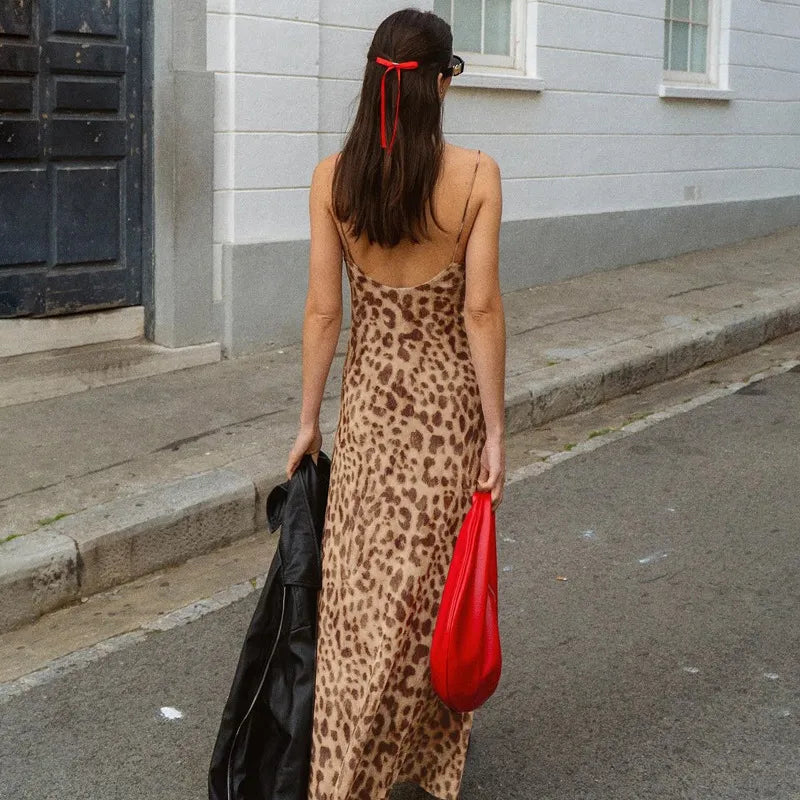 Leopard print dress back view walking on street