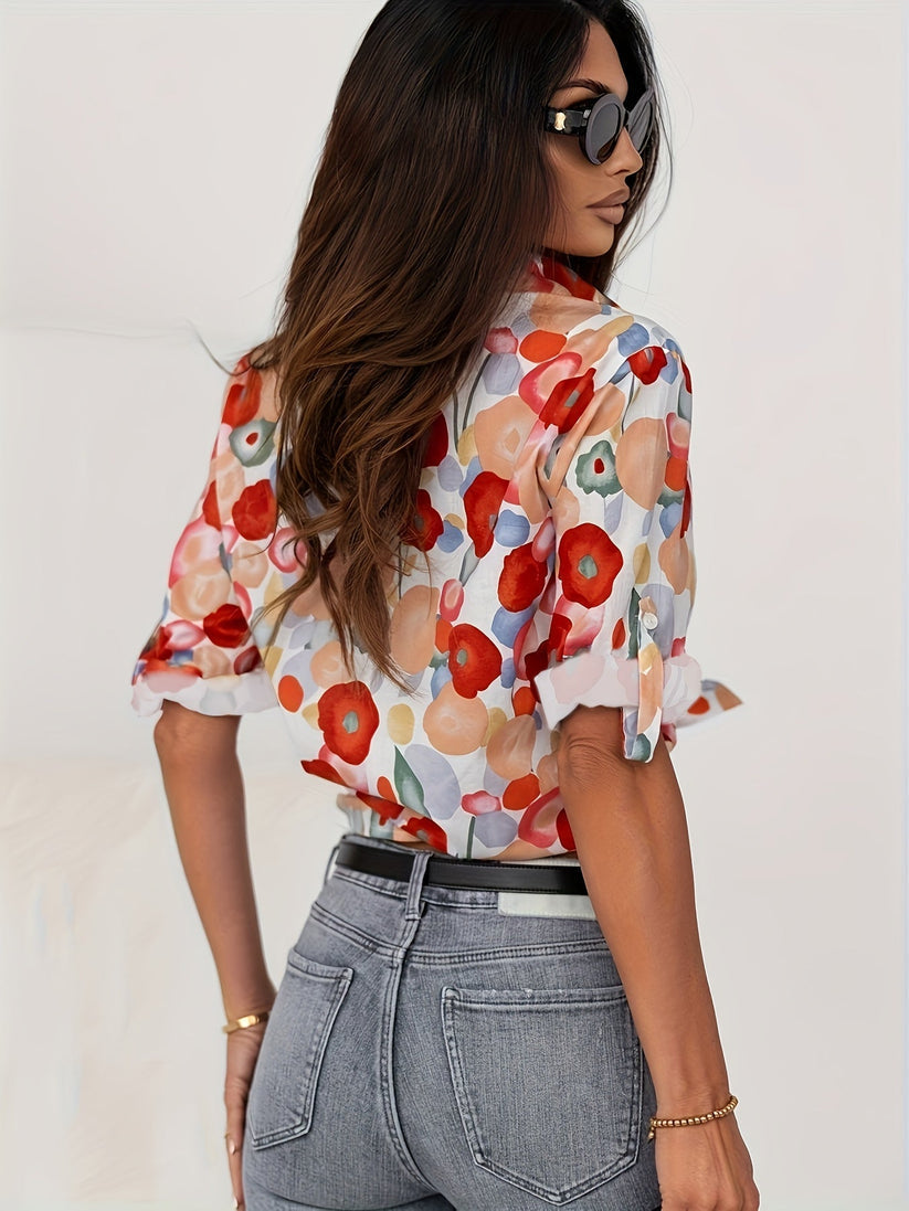 Blouse with bold floral design, back view