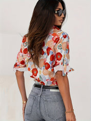 Blouse with bold floral design, back view