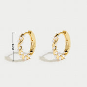 Gold hoop earrings with pearl accents, front view with size measurement