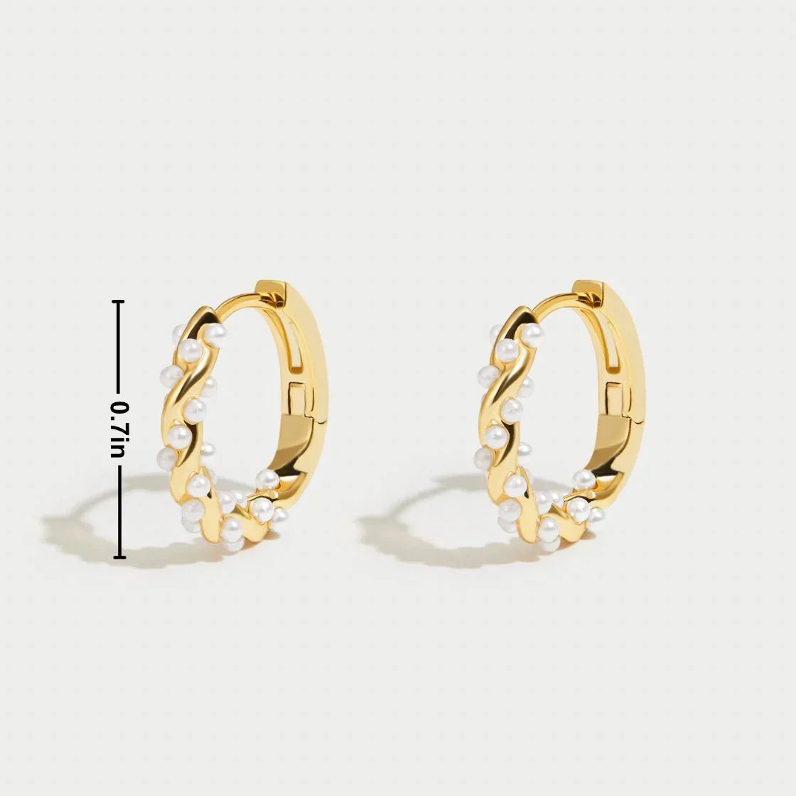Gold hoop earrings with pearl accents, front view with size measurement