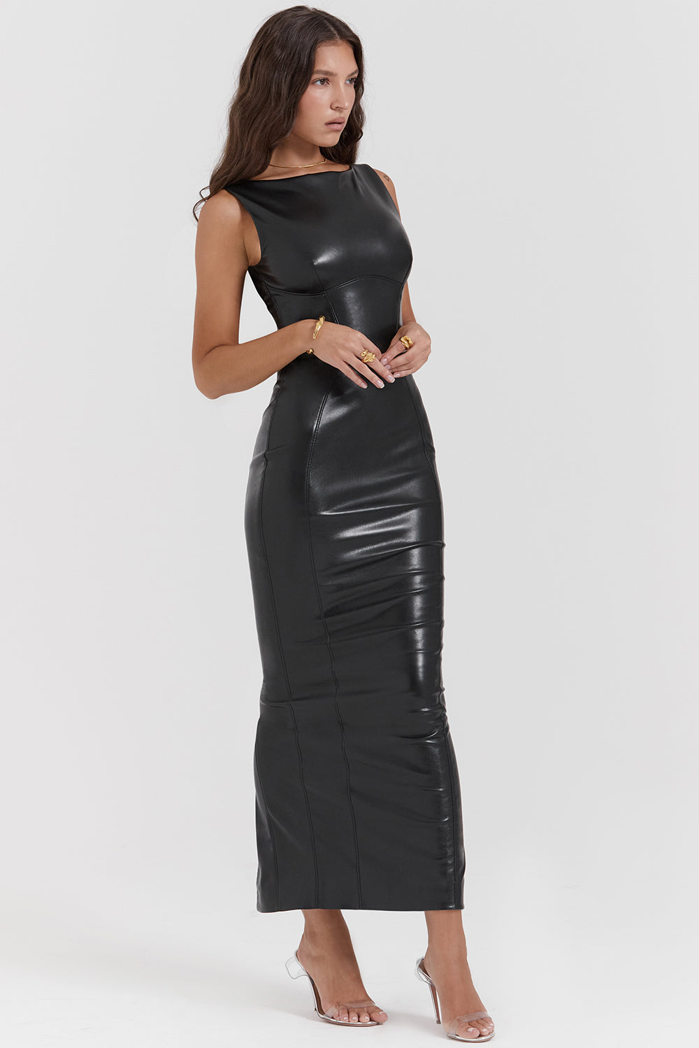 Black faux leather bodycon maxi dress front view with hands clasped