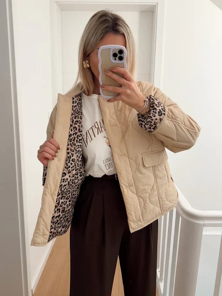 Jas met luipaardprint beige en zwart achterzijde