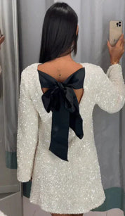 White sequin dress with black bow back view